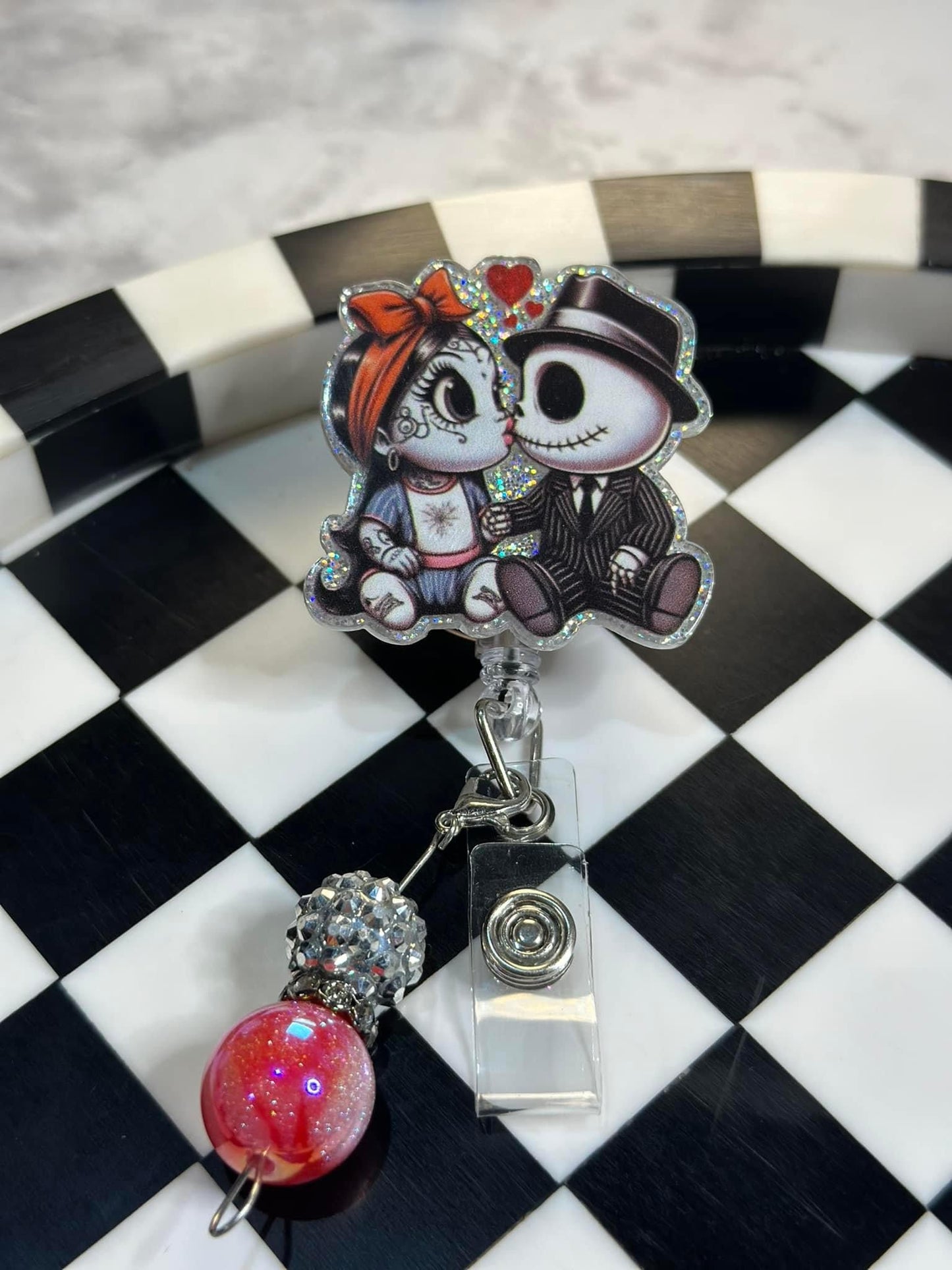 J & S kiss Badge Reel