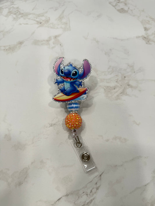 Surfboard badge reel