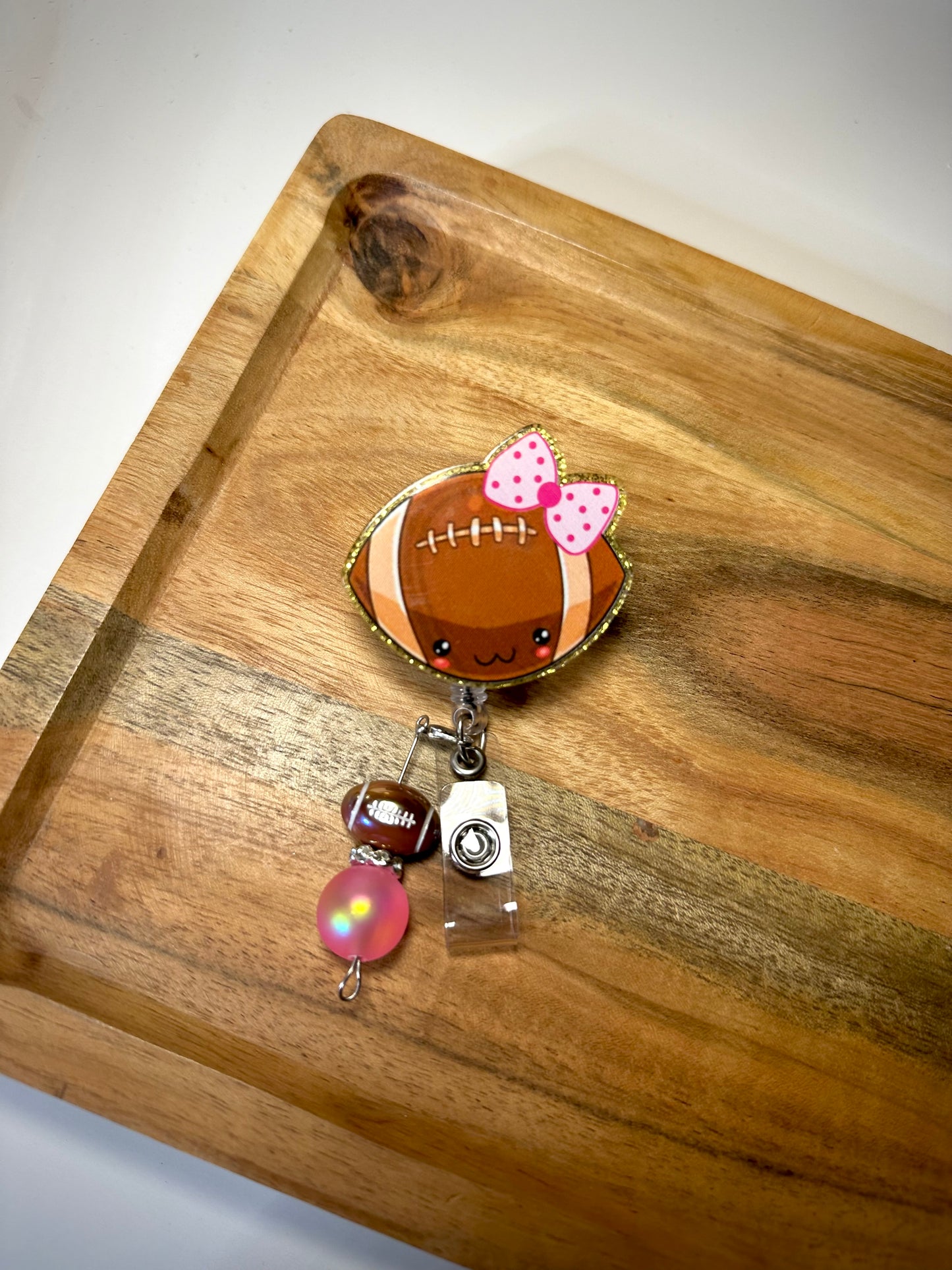 Football Bow Badge Reel